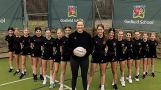 Talented - professional netball player George Fisher with Gosfield School pupils