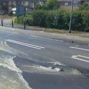 WATCH - Chaos as road collapses and water main bursts near homes