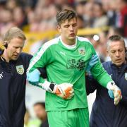 Burnley goalkeeper Nick Pope went off injured at Pittodrie