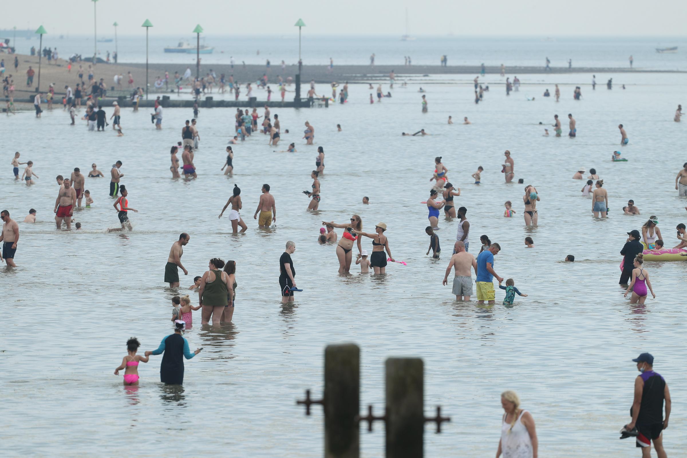 People enjoy the hot weather at Southend beach in Esse