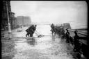 Cleaning up Hove promenade after stormy seas in 1938. Photos: East Sussex Record Office/The Keep (ARG/3/3059V)