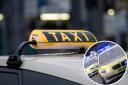 A taxi driver was allegedly threatened