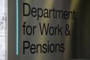 A view of signage for the Department of Work and Pensions in Westminster, London.