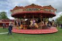 ON THE GALLOPERS: Visitors enjoying the vintage rides at Carters Steam Fair