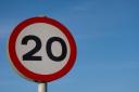 A 20mph speed limit sign.