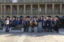 Laying flowers at the Anne Lister statue in the Piece Hall, Halifax at the 2022 Anne Lister Memorial Weekend
