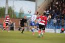 Control - Colchester United's Noah Chilvers battles for possession during his side's 4-1 defeat to Doncaster Rovers