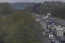 Traffic queueing on Essex motorway after vehicle blaze and overturned lorry