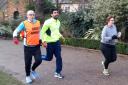 Marathon runners - Gareth Gailey with VI runner Wali Mohammad Khail in Castle Park