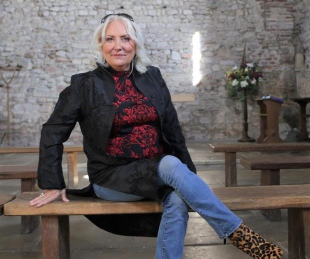 Brentwood Live: Martina Cole is pictured at St Peter's Chapel on the Wall, Bradwell. Picture: Visit Essex/BigWavePR