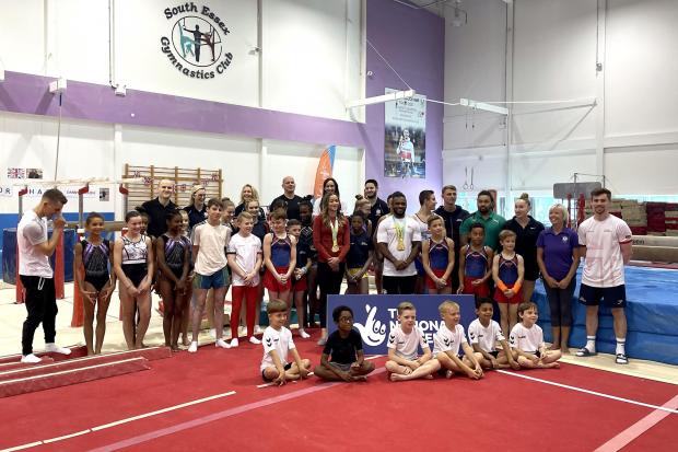 Brentwood Live: Max Whitlock (left), Georgia-Mae Fenton (centre) and Courtney Tulloch poses for photographers at the South Essex Gymnastics Club (PA)