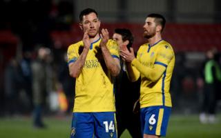 Thanks - Tom Hopper applauds the Colchester United fans following the 1-1 draw at Salford City